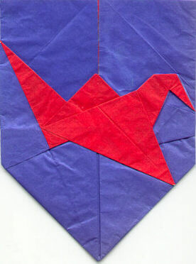 Shield with flapping bird (logo of British Origami Society)